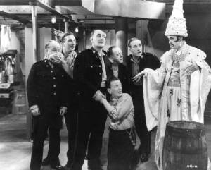 The genie (Alastair Sim) grants his new owners any wish 
